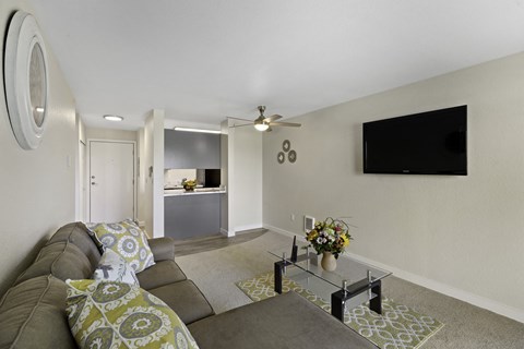 a living room with a couch and a coffee table